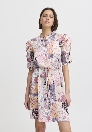 Short-sleeved dress with a buttoned front, featuring a mix of paisley and floral patterns in pink, cream, and black with a tied waist.