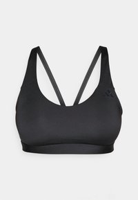 Soutien-gorge de sport noir en tissu lisse et extensible. Présente une encolure dégagée et des bretelles croisées. Design minimaliste avec un détail de logo.