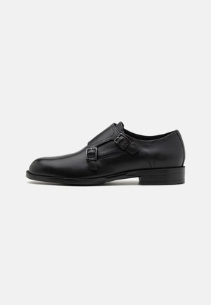 TAYIL - Belebújós cipők - black