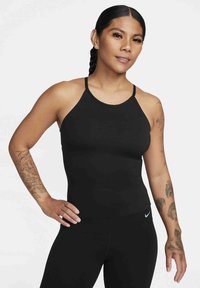 Black athletic tank top with a high neckline and thin straps. The fabric is smooth with a fitted design, paired with matching leggings.