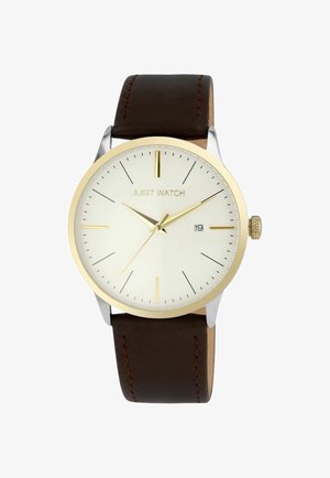Brown leather strap watch with a silver and gold case, cream dial, gold accents, and black hour markers. Features date display at 3 o'clock.