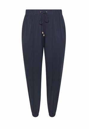 Marineblaue Hosen mit elastischem Bund, Kordelzug und elastischen Bündchen, die eine entspannte Passform und vertikale Nahtdetails aufweisen.