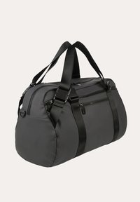 Borsa da viaggio nera con forma arrotondata, realizzata in tessuto strutturato, dotata di due manici superiori e multiple tasche con cerniera.