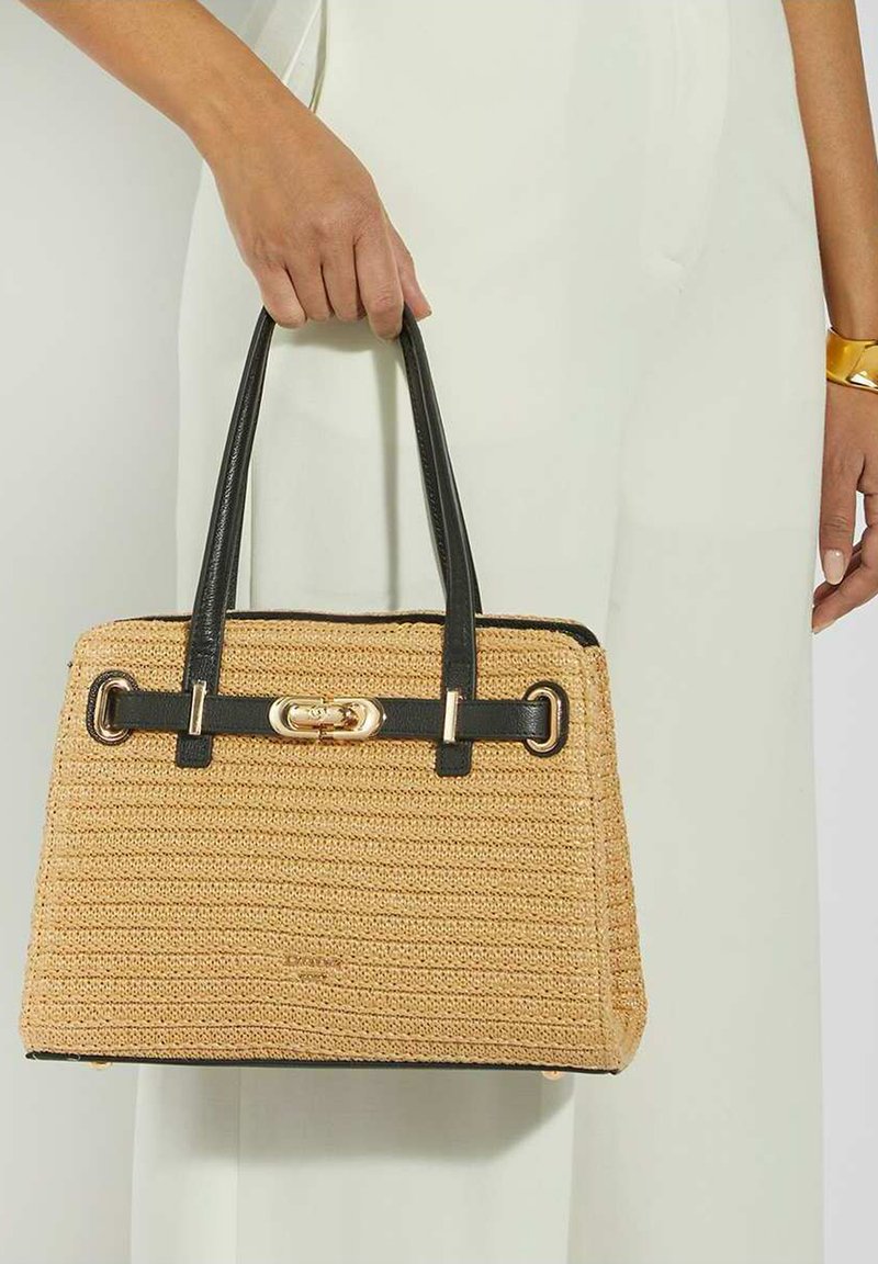 Woven texture beige handbag with black leather accents and handles. Features a gold-tone clasp and rectangular shape.