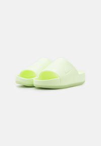 Nike Sportswear CALM żółty neon
