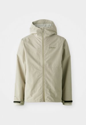 Lys beige vanntett jakke med hette, glidelås foran, elastiske mansjetter og kontrastfargede svarte detaljer på ermene. Har et minimalistisk design.