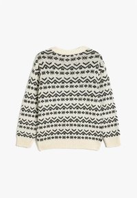 Sweter wełniany w kolorze kremowym z czarnymi geometrycznymi wzorami. Posiada stosowany okrągły dekolt i długie rękawy. Teksturowany materiał.