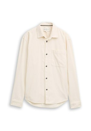 Chemise à manches longues couleur crème en tissu texturé. Dotée d'un col pointu, d'une fermeture à boutons sur le devant et d'une poche poitrine.