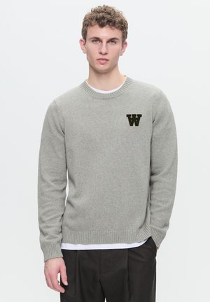 Light gray knitted sweater with a crew neck, ribbed cuffs, and hem. Features a dark embroidered 'W' logo on the chest.