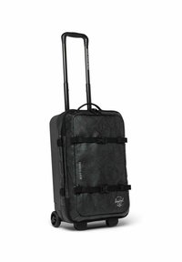 Sac à roulettes noir avec un tissu texturé, poignée rétractable et sangles noires. Présente un logo et des dimensions imprimées sur le côté.