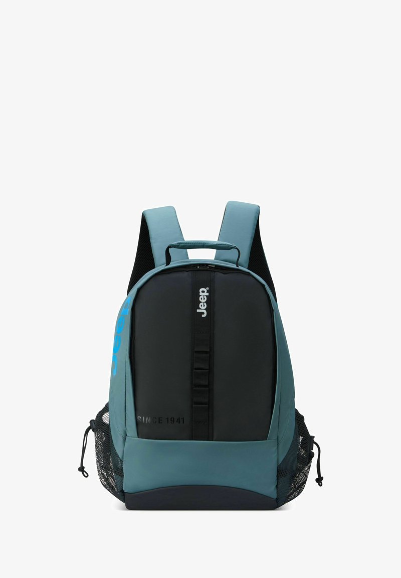 Zaino in teal e nero, realizzato in tessuto resistente. Presenta tasche laterali in rete, manico rinforzato e logo del marchio. Forma rettangolare con spallacci regolabili.