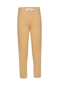Beige tapered Jogginghosen mit Fronttaschen und einer weißen Kordel am elastischen Bund, gezeigt auf einem einfarbigen Hintergrund.