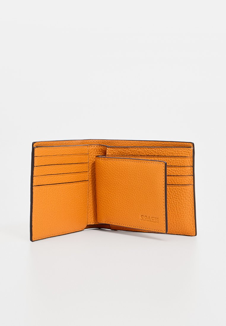 Lederbörse in lebhaftem Orange mit strukturiertem Finish. Verfügt über mehrere Kartenfächer und einen abnehmbaren Kartenhalter. Kontrastierende schwarze Ränder.