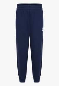 Marineblaue Jogginghose aus weichem Material, mit einem elastischen Bund, schmal zulaufenden Beinen und einem weißen Logo auf der linken Seite.