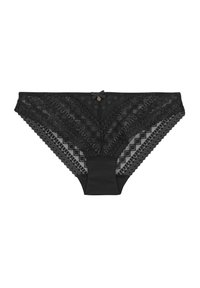 String en dentelle noire avec des motifs géométriques raffinés, une taille solide et un petit nœud au centre arrière. Design texturé.