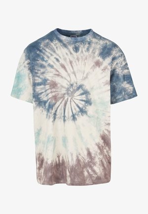 Lühikeste varrukatega puuvilla T-särk, millel on kreemivalgel taustal spirali batikmuster sinise, teali ja pruuni tooni. Ümmargune kaelus.