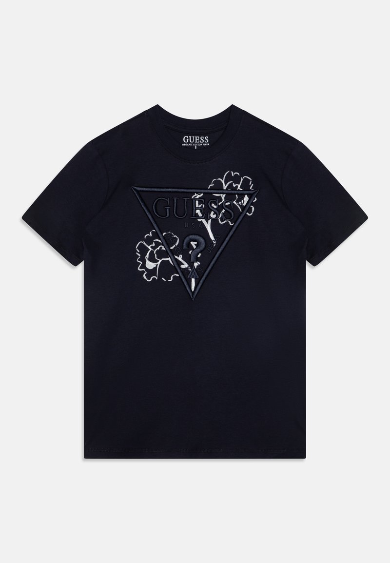 Navy-blaues Baumwoll-T-Shirt mit einem geprägten, dreieckigen GUESS-Logo und floralen Akzenten. Kurze Ärmel und runder Ausschnitt.