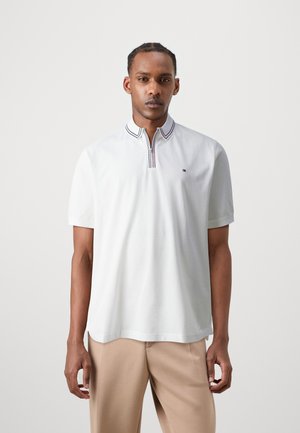 - Koszulka polo