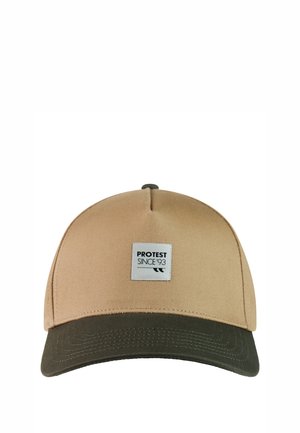 Beige and dark green baseball cap with a white square patch reading "PROTEST SINCE '93" on the front center.