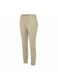 Jeans skinny beige con una tela ligeramente elástica, que cuentan con un cierre frontal con botón, trabillas para cinturón y un diseño de cinco bolsillos.