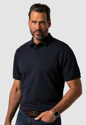 Námořnická polokošile s klasickým designem, krátkými rukávy a knoflíkovým límcem. Vyrobena z hladkého materiálu s jemnou strukturou.