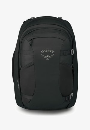 Sac à dos de voyage Osprey Fairview 55 noir avec plusieurs compartiments à fermeture éclair et sangles latérales ajustables.