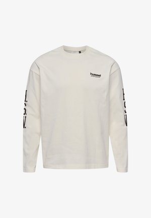 Langermet kremfarget t-skjorte i bomull med rund hals. Har "hummel"-logo i svart på brystet og stor svart tekst langs ermene.