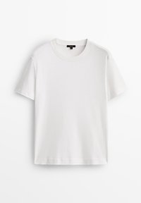 T-shirt en coton blanc uni à manches courtes et col rond, présenté à plat sur un fond blanc.