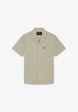 Helebeež lühikeste varrukatega särgikrae, millel on rinnatasku ja vasakul küljel väike kollase linnu logo.