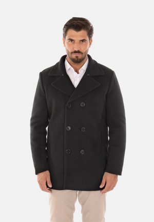 Cappotto nero in misto lana, caratterizzato da un design doppiopetto, ampi rever e due tasche laterali. Texture liscia e vestibilità classica.