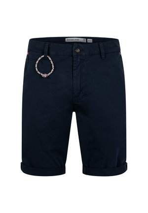 Short en coton bleu marine avec revers roulés, fermeture par bouton, passants de ceinture, petite poche avant et boucle tressée pour porte-clés attachée sur le côté gauche.