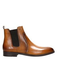 Stivale Chelsea in pelle marrone con pannelli elasticizzati, punta rotonda, tacco basso e un'asola per una facile calzata. Finitura liscia con un leggero lucido.