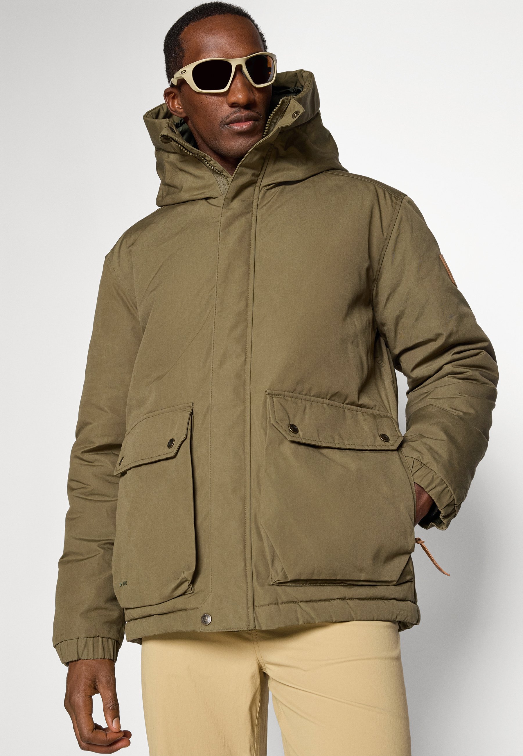 Fjällräven ÖVIK PADDED JACKET - Winter jacket - laurel green/green