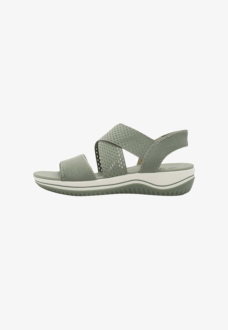 Sandales vertes en maille avec un design à bride croisée, tige texturée et semelle en caoutchouc blanche. Présentent des perforations pour la respirabilité et le confort.