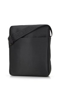 Borsa a tracolla nera realizzata in nylon texturizzato. Forma quadrata con una tasca frontale e tracolla regolabile. Dettaglio di branding sottile sulla tracolla.