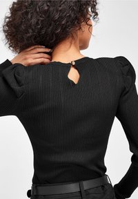 Next Trui - black