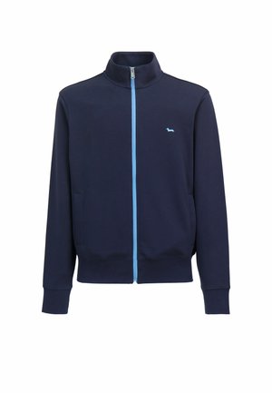 Giacca blu navy con zip azzurra chiaro e piccolo logo a forma di cane azzurro chiaro sul petto sinistro, con maniche lunghe e collo alto.