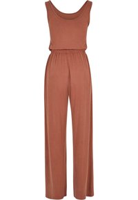 Brun brun u-sleeveless jumpsuit med rund hals, elastisk midje og vide bukser, laget av et mykt, elastisk stoff.