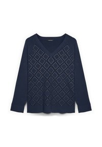 Námořnický modrý svetr s výstřihem do V a rukávy tři čtvrtě. Obsahuje diamantové výřezy orámované bílým stehem přes přední část.