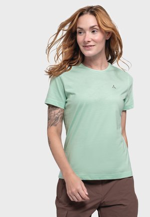 Hellgrünes T-Shirt mit kurzen Ärmeln aus weichem Stoff. Verfügt über einen runden Halsausschnitt und dezente Logodetails auf der Brust.