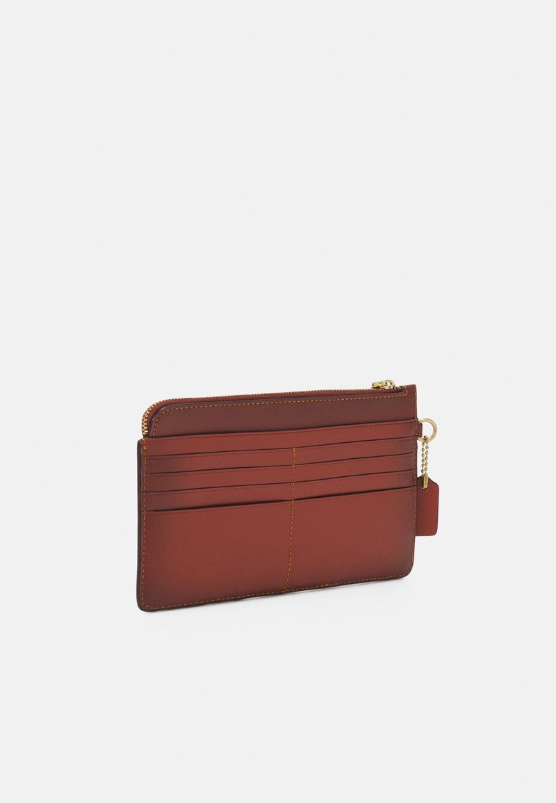 Damen Geldbörsen | Coach COATED SIGNATURE ZIP WRISTLET Geldbörse tan/rust/braun - UJ46702 Damen Geldbörsen | Coach COATED SIGNATURE ZIP WRISTLET Geldbörse tan/rust/braun - UJ46702