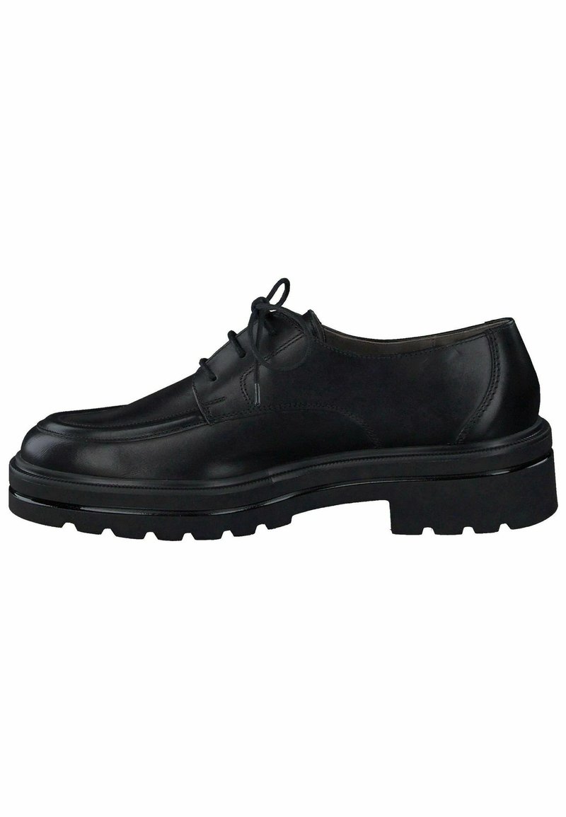 Chaussure habillée en cuir noir à lacets avec semelle crantée épaisse et bout arrondi, vue de côté sur fond blanc.