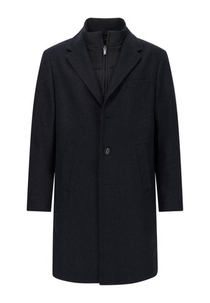 Manteau en laine bleu marine foncé avec une coupe structurée, des revers crantés, deux poches avant, une fermeture par un bouton unique et une doublure intérieure matelassée.