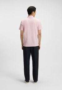 BOSS PALLAS - Polo shirt - light pink four