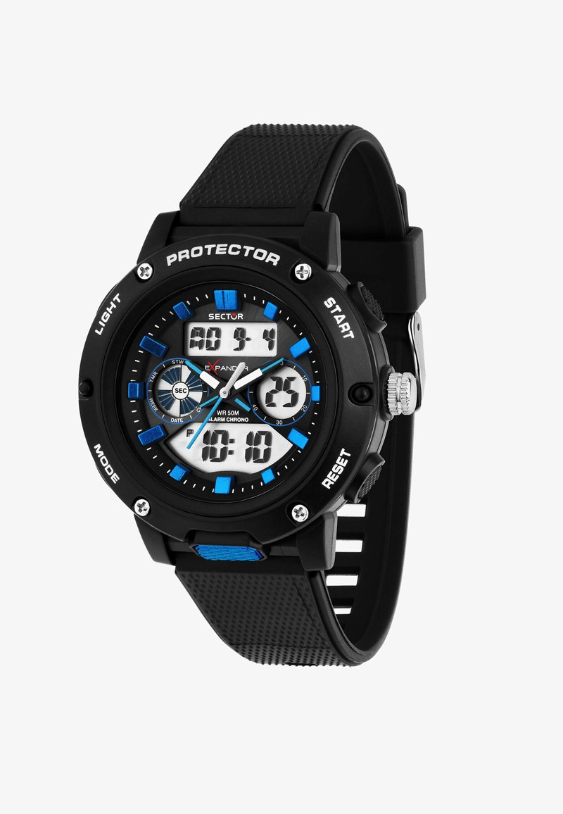 Orologio digitale nero con accenti blu, quadrante rotondo, cinturino in gomma, funzioni di visualizzazione multiple e elementi hardware protettivi contrassegnati con i comandi.