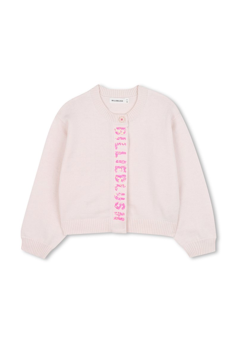 Jasnoróżowy sweter z dzianiny, z okrągłym dekoltem, zapięciem na guziki oraz ozdobnym różowym napisem na przodzie. Ściągacze przy mankietach i u dołu.