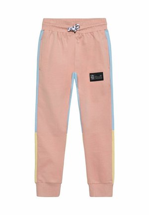 Rosa Jogginghosen mit blauen und gelben Seitenpaneelen, elastischem Bund mit schwarz-weißem Kordelzug und einem schwarzen quadratischen Logo-Patch am linken Oberschenkel.