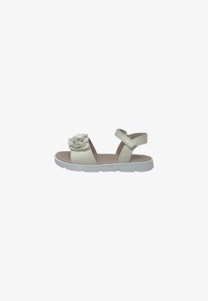 Sandalo beige per bambini con cinturino regolabile alla caviglia e fiore decorativo sulla fascia anteriore, con suola bianca flessibile.