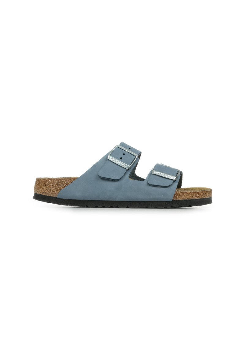Blue leather slide sandal with two adjustable straps, silver hardware, and a cork footbed. Textured rubber outsole for grip.