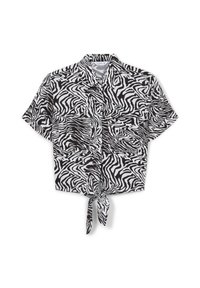 Camicetta corta a maniche corte in stampa zebra bianca e nera, con un dettaglio di legatura frontale e due tasche sul petto. Tessuto leggero.
